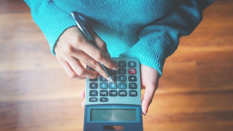 Woman using a calculator